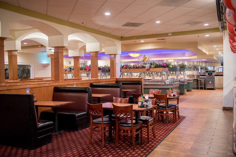 Bright buffet restaurant with open dining space.